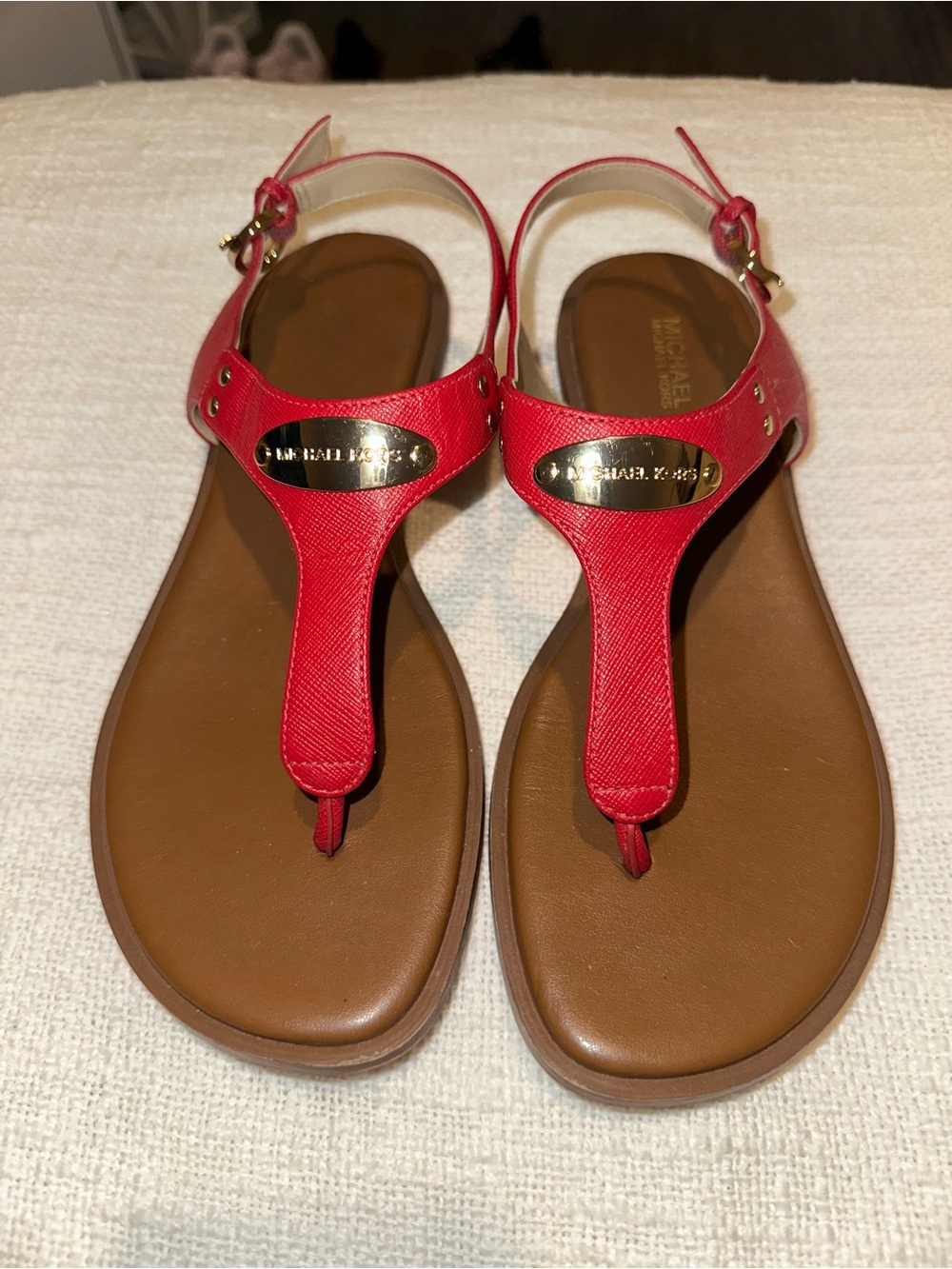 Michael Kors Red T-Strap Sandals with Gold Plaque